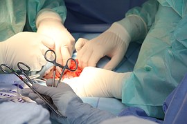 Podiatrist doing an operation