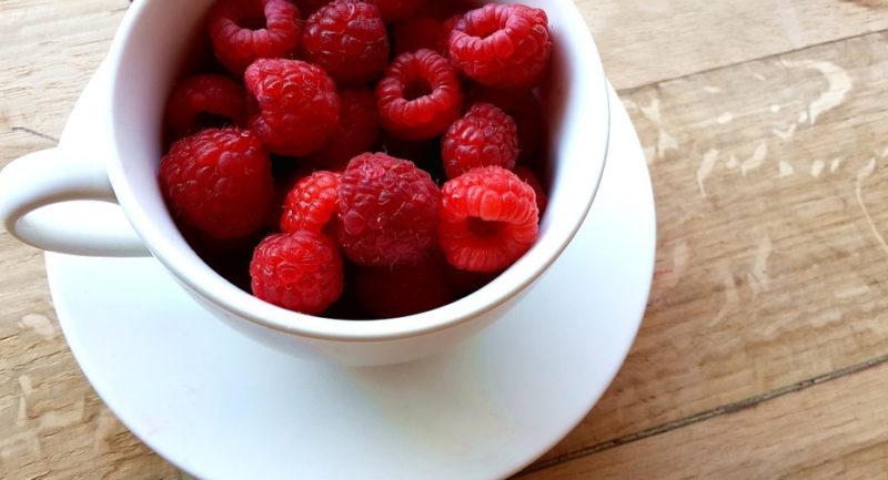 a cup of strawberries