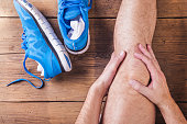 holding an ankle